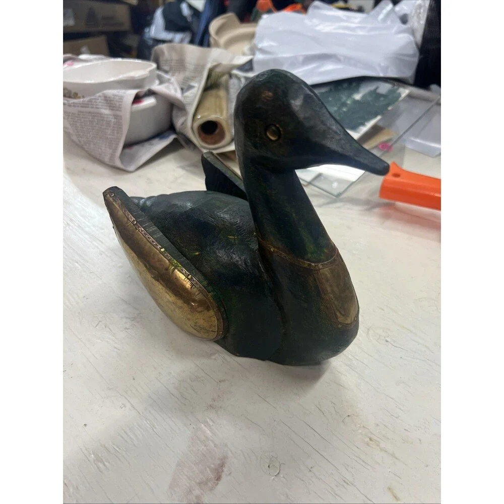 Unique wood and metal carved duck
